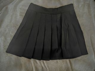 Falda plisada negra