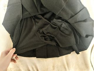 Falda plisada negra