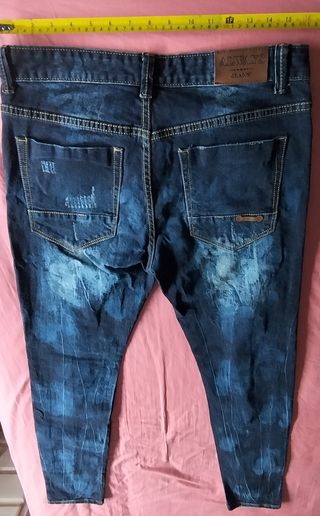 Pantalones de hombre variados en muy buen estado