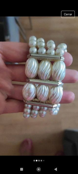Pulsera perlas doradas 1.50