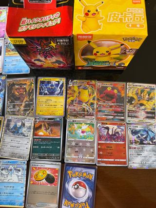Carte Pokemon: Giapponesi, Cinesi & Charizard