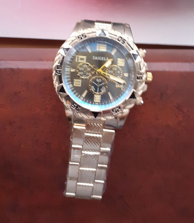 2 Relojes SAIGELA dorados