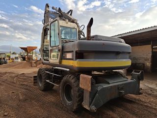 EXCAVADORA RUEDAS FIAT-HITACHI 395 BT.  – Año 1.99