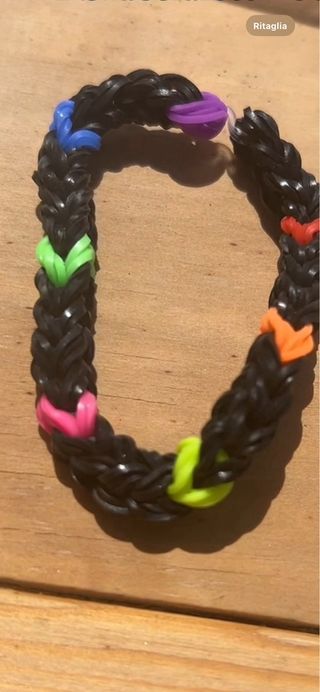 Braccialetti loom bianco arancione e nero multi