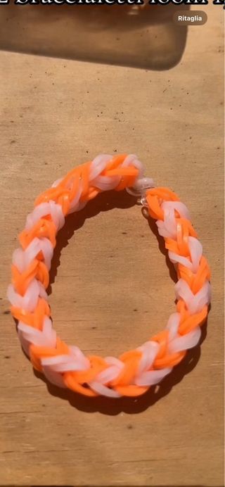 Braccialetti loom bianco arancione e nero multi