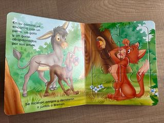 Libro y puzzles Los músicos de Bremen