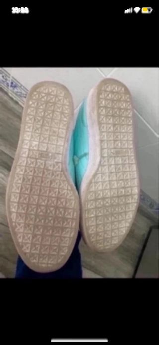 Zapatillas Puma Basket turquesa con lazo
