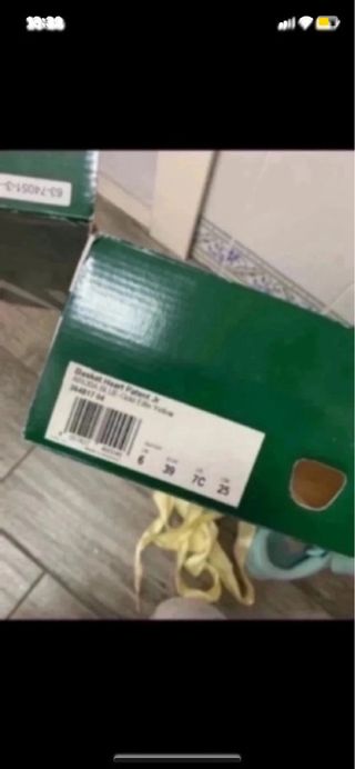 Zapatillas Puma Basket turquesa con lazo
