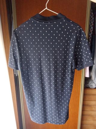 Polo C&A negro talla XS