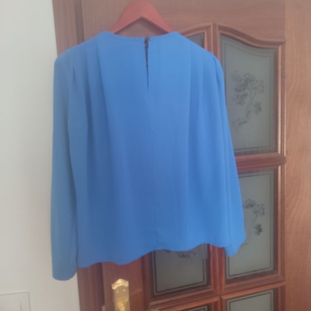 Blusa azul manga larga