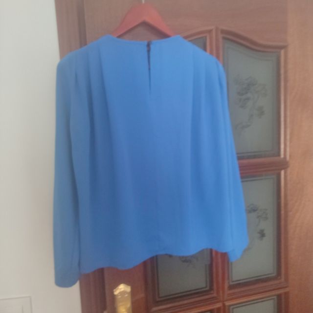 Blusa azul manga larga