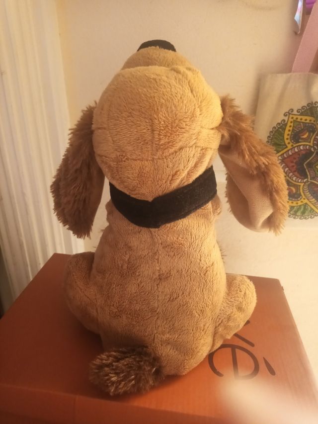 Perro musical orejas moviles. Peluche movible
