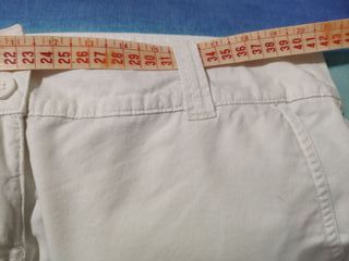 PANTALÓN BLANCO DE CAMPANA. MUJER T-38