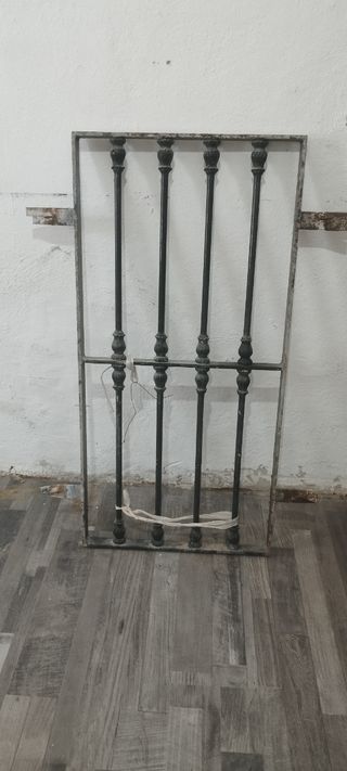 Ventana climalit con persiana y reja
