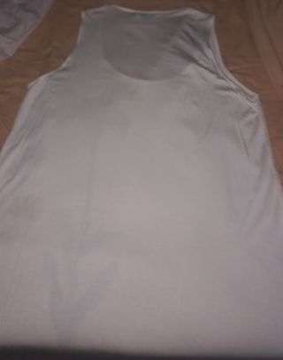 Camiseta lentejuelas dorada con flor