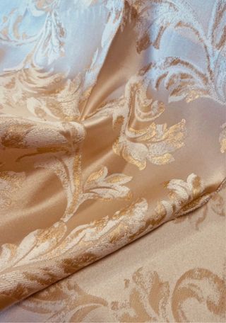 Tessuto broccato beige e oro