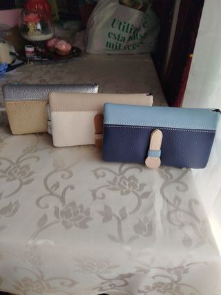 Monederos mujer dorado,plateado, crema y azul