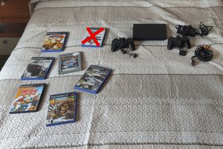 PS2 (PlayStation 2) - 2 mandos + juegos