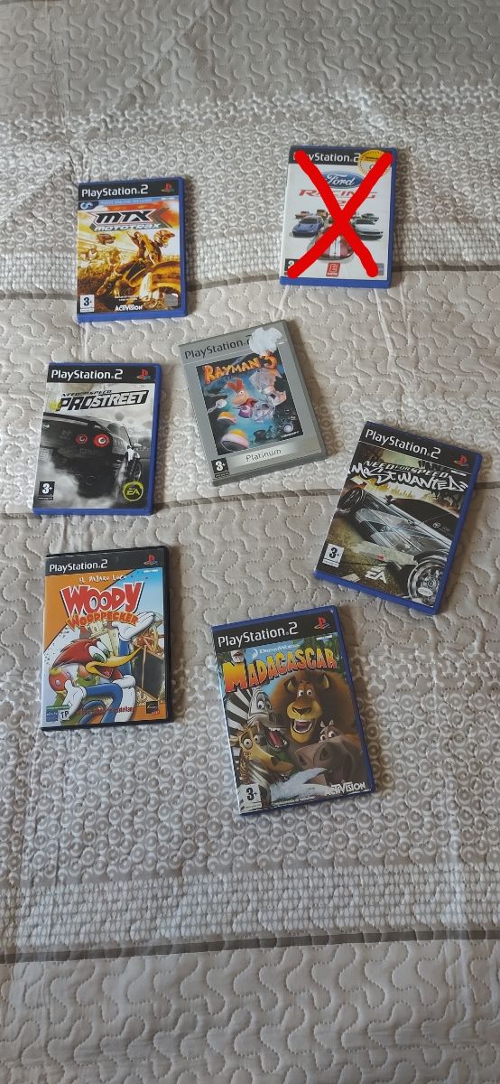 PS2 (PlayStation 2) - 2 mandos + juegos