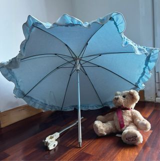 Saco bebé azul claro + sombrilla