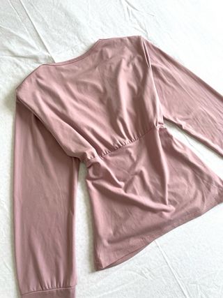 Top rosa a manica lunga taglia M