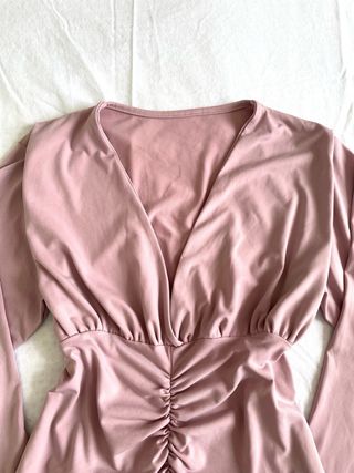 Top rosa a manica lunga taglia M