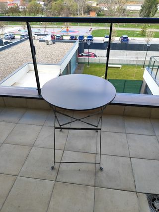 Mesa plegable circular.