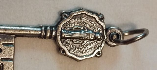 Colgante de plata llave