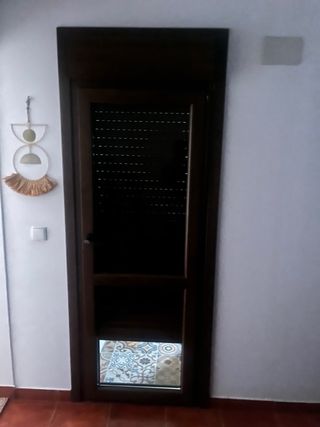 Puerta con persiana integrada