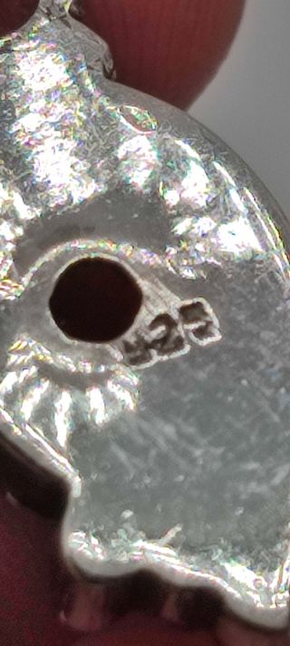 Colgante de plata y ámbar.