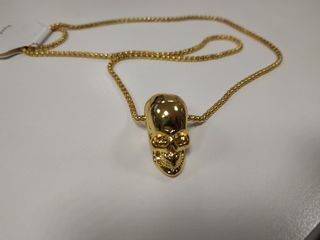 Collana vintage con ciondolo a forma di teschio...
