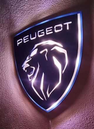 Logo peugeot con luce a led
