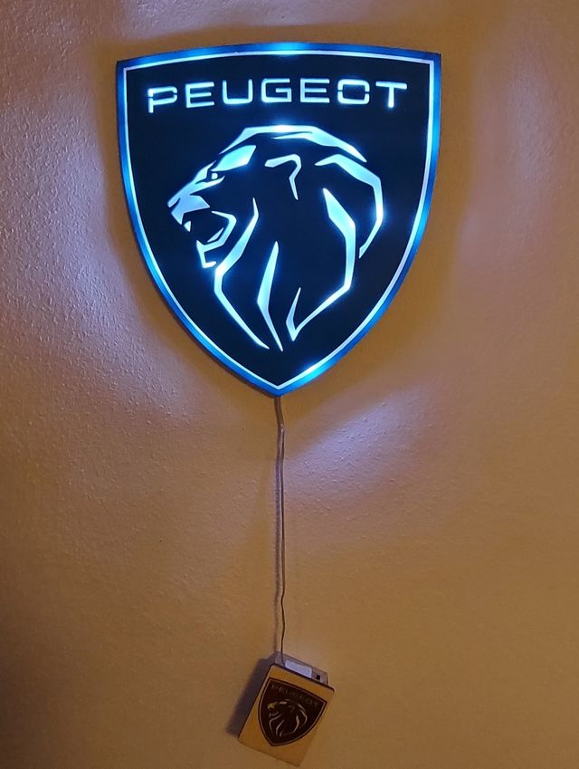 Logo peugeot con luce a led