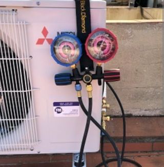 Carga de gas y reparación