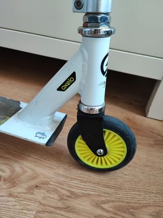 Patinete Oxelo Mid 7 con manguitos nuevos 