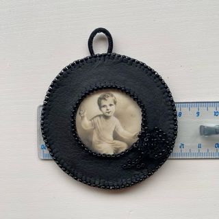 santino a ciondolo 
