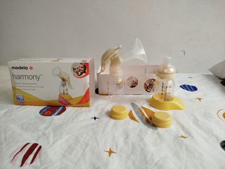Sacaleches Medela Harmony + biberón