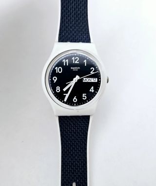 Reloj Swatch Navy Light blanco y azul marino 
