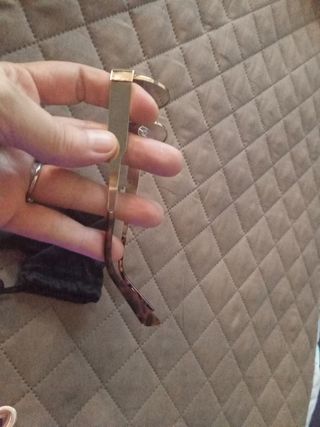 Gafas sol redondas doradas