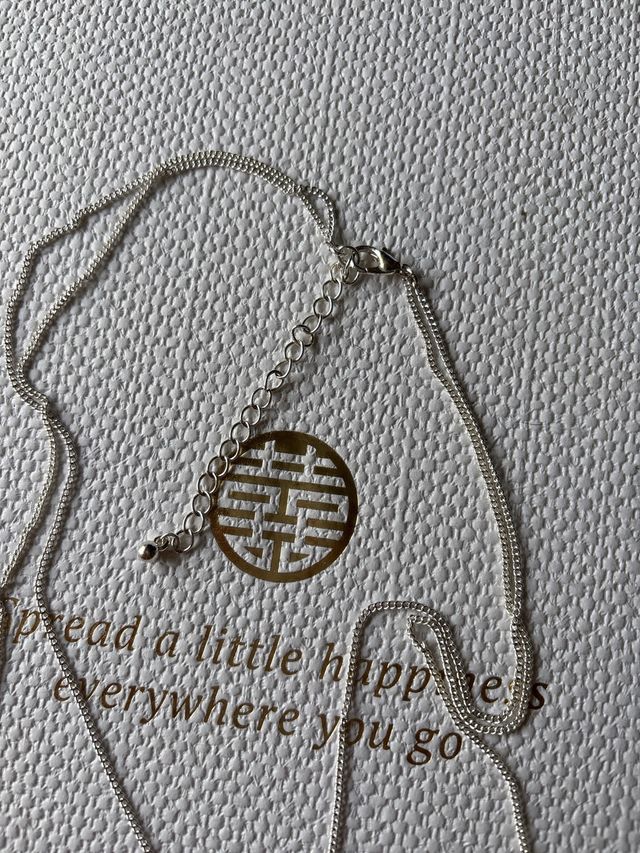 Conjunto de dos collares plateados