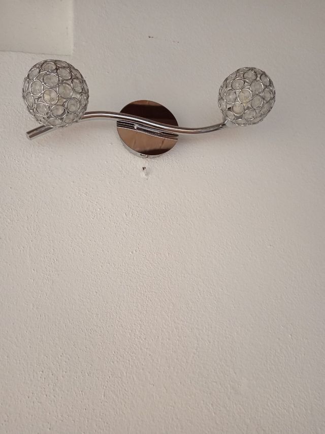 Applique moderne 2 e 4 luci argento