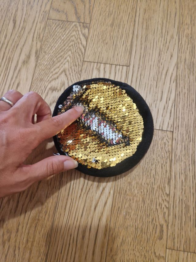 Pochette con pailettes reversibili nuova