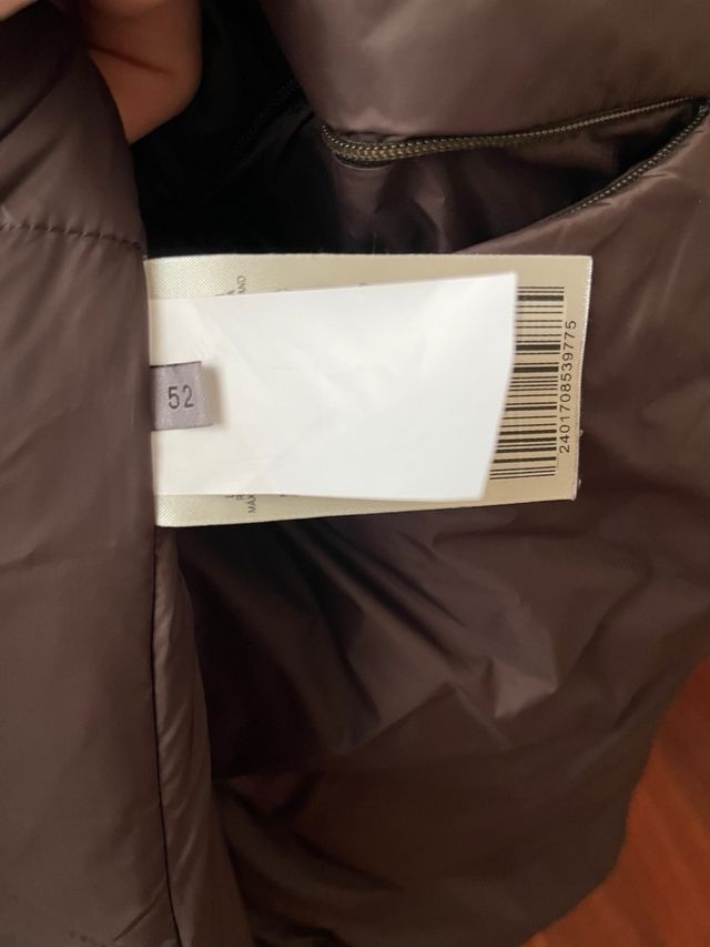 Chaqueta negra plumas