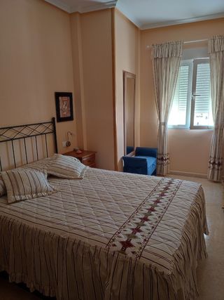 Edredón y cortinas de tela