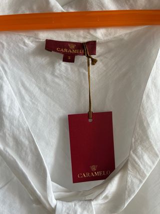 Blusa Caramelo blanca sin mangas
