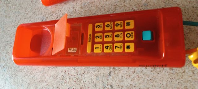 Telefono Swatch arancione vintage