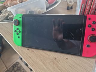 Nintendo Switch OLED + 6 giochi + controller Pro