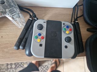 Nintendo Switch OLED + 6 giochi + controller Pro