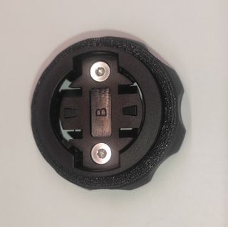 Adaptador Quad Lock a Discos CC22mm.