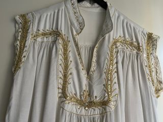 Abito egiziano bianco e oro